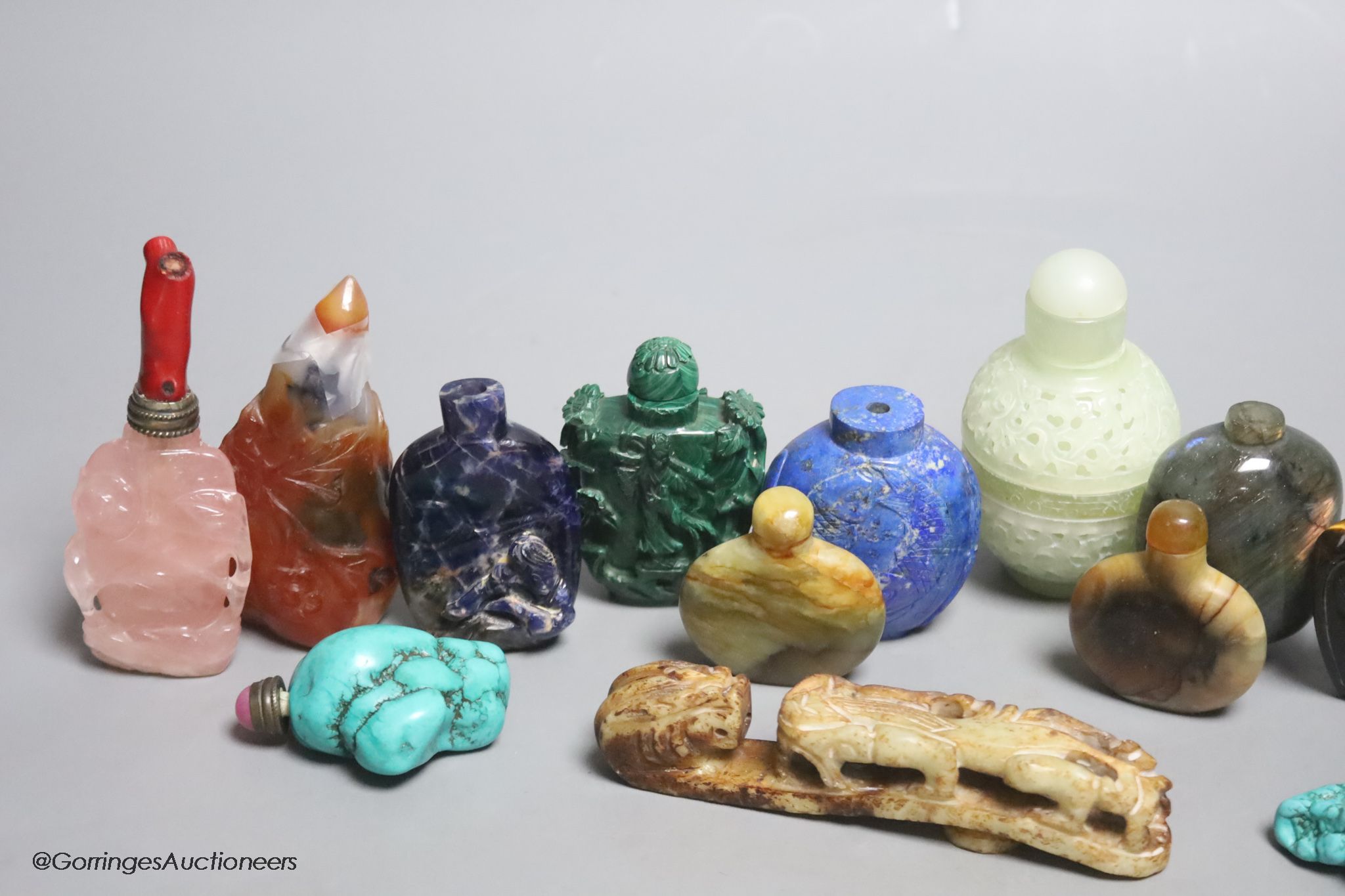 Thirteen mixed Chinese lapis lazuli, turquoise and other carved snuff bottles